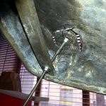 Fixation dans le socle